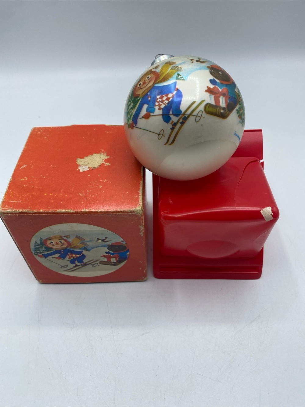 1973 Corning Stocking Stuffers Raggedy Ann Andy Skiing Christmas Ornament USA